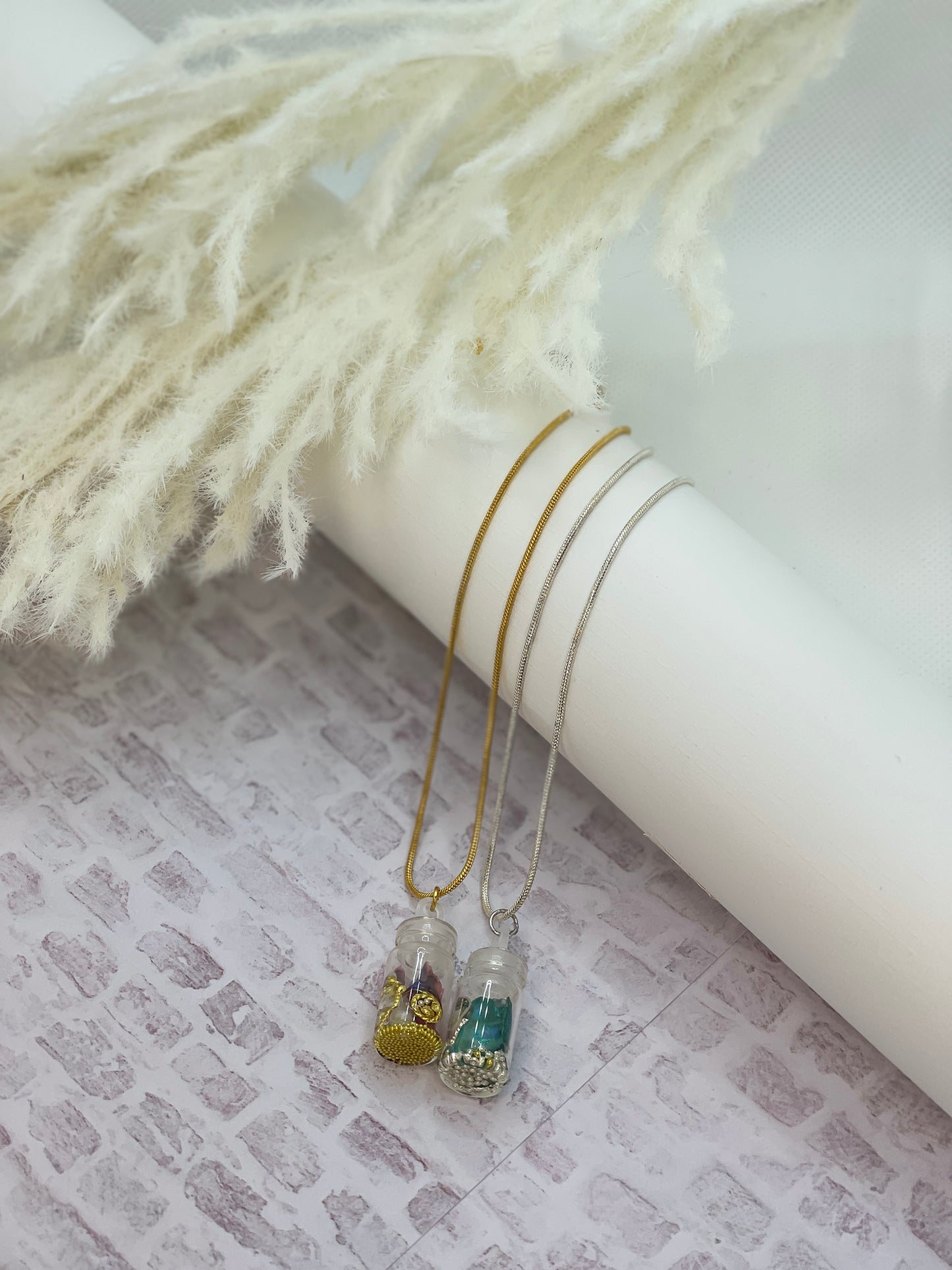 Stress-Relieving Bottle Charm Necklace - The Crown